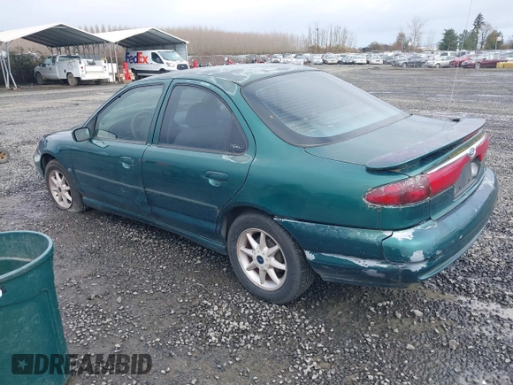 1999 Ford Contour SE Fleet with VIN 1FAFP66L3XK227522, listed as a IAAI auction lot 41702873 with 140,926 mi miles. Bid and sale history available at carsss.com. Image 3.
