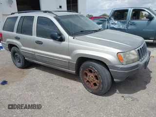 2003 Jeep Grand Cherokee Laredo with VIN 1J4GX48S73C515727, listed as a IAAI auction lot 42555080 with 275,035 mi miles and . Bid and sale history available at DreamBid. Image 1.