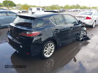 2011 Lexus CT 200h with VIN JTHKD5BH2B2031222, listed as a IAAI auction lot 41551693 with 123,596 mi miles. Bid and sale history available at carsss.com. Image 4.