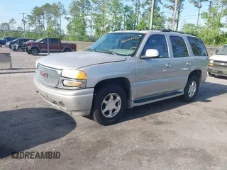 2004 GMC Yukon Denali z VIN 1GKEK63U94J249578, wystawiony jako IAAI lot #42088940 z przebiegiem 253 352 mil mil oraz . Historia ofert i sprzedaży dostępna na DreamBid. Obrazek 2.