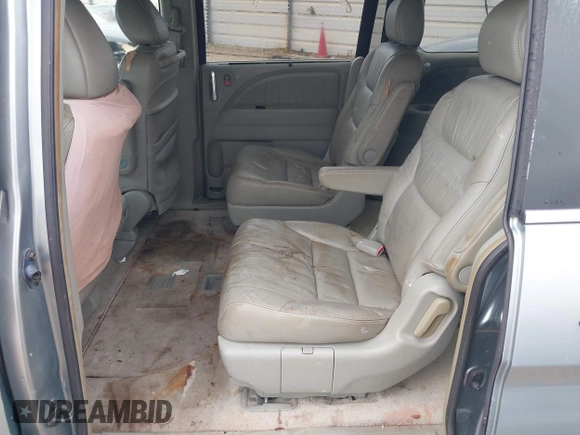 2005 Honda Odyssey Touring с VIN 5FNRL38805B120917, выставлен на аукционе IAAI как лот 42396531 с пробегом 267 626 миль миль и . История ставок и продаж доступна на DreamBid. Изображение 8.