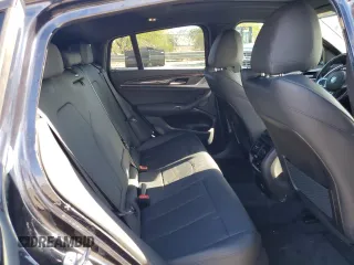 2021 BMW X4 M40i with VIN 5UX2V5C06M9E04443, listed as a Copart auction lot 72061194 with 71,637 mi miles and Salvage title. Bid and sale history available at DreamBid. Image 11.