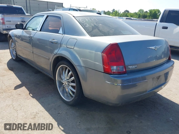 2006 Chrysler 300 Touring with VIN 2C3KA53G06H172162, listed as a IAAI auction lot 42005963 with 209,549 mi miles. Bid and sale history available at carsss.com. Image 3.