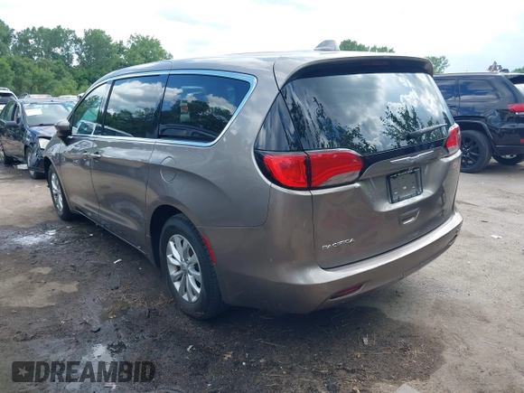 2017 Chrysler Pacifica Touring z VIN 2C4RC1DG2HR833473, wystawiony jako IAAI lot #42597208 z przebiegiem 78 239 mil mil oraz . Historia ofert i sprzedaży dostępna na DreamBid. Obrazek 3.