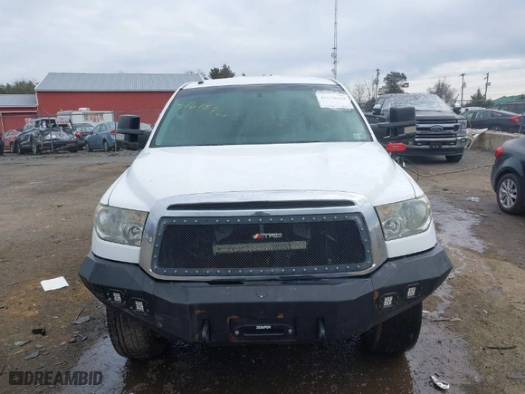 2012 Toyota Tundra 4WD Truck with VIN 5TFUM5F16CX036743, listed as a IAAI auction lot 41618964 with 134,413 mi miles. Bid and sale history available at carsss.com. Image 12.