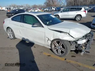 2014 BMW 4 Series 435i with VIN WBA3R1C56EK191996, listed as a IAAI auction lot 41450981 with 125,352 mi miles and . Bid and sale history available at carsss.com. Image 1.