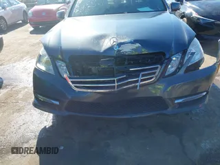 2013 Mercedes-Benz E-Class E 350 Luxury BlueTEC with VIN WDDHF2EB8DA721566, listed as a IAAI auction lot 41252973 with 144,580 mi miles. Bid and sale history available at carsss.com. Image 6.