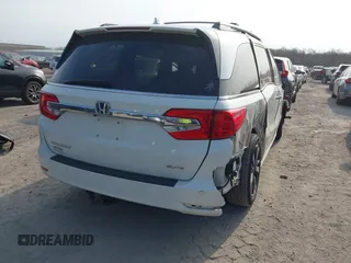 2019 Honda Odyssey Elite with VIN 5FNRL6H90KB019835, listed as a IAAI auction lot 42054752 with 110,659 mi miles and . Bid and sale history available at DreamBid. Image 4.