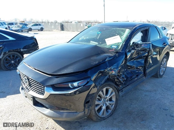 2021 Mazda CX-30 Select with VIN 3MVDMABL2MM244740, listed as a IAAI auction lot 41732095 with 70,575 mi miles. Bid and sale history available at carsss.com. Image 2.