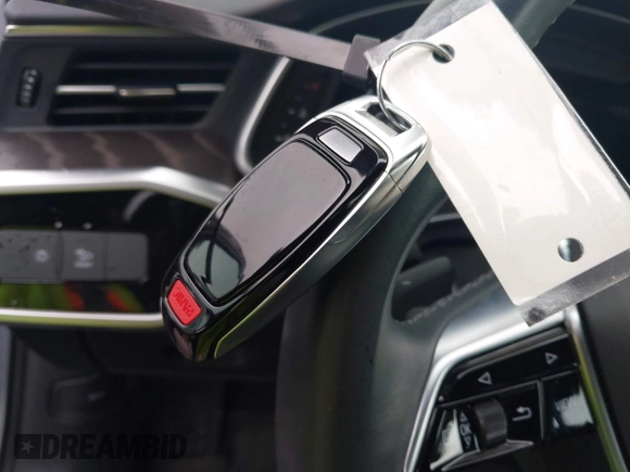 2023 Audi A6 Premium z VIN WAUD3BF27PN068058, wystawiony jako IAAI lot #42179522 z przebiegiem 7 869 mil mil oraz . Historia ofert i sprzedaży dostępna na DreamBid. Obrazek 11.