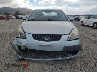 2009 Kia Rio LX with VIN KNADE223496469797, listed as a Copart auction lot 71005774 with 130,675 mi miles and Salvage Title. Bid and sale history available at carsss.com. Image 5.