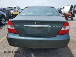 2004 Toyota Camry LE z VIN 4T1BE32K34U294224, wystawiony jako Copart lot #59581595 z przebiegiem 188 034 mil mil oraz Szkoda całkowita • Salvage title. Historia ofert i sprzedaży dostępna na DreamBid. Obrazek 6.
