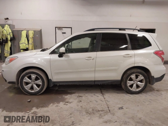 2015 Subaru Forester 2.5i Limited with VIN JF2SJAHC1FH447474, listed as a IAAI auction lot 41638702 with 224,584 mi miles. Bid and sale history available at carsss.com. Image 14.