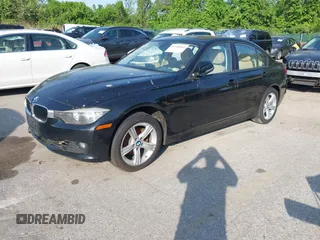 2014 BMW 3 Series 328i xDrive with VIN WBA3B5G56ENS06890, listed as a IAAI auction lot 42168982 with 133,664 mi miles. Bid and sale history available at carsss.com. Image 2.