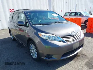 2015 Toyota Sienna LE with VIN 5TDJK3DCXFS094401, listed as a IAAI auction lot 42378306 with 124,832 mi miles and . Bid and sale history available at DreamBid. Image 1.