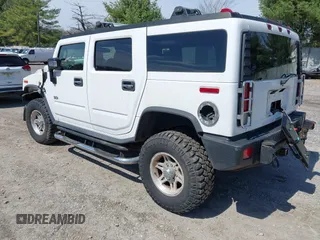 2006 Hummer H2 with VIN 5GRGN23U86H104660, listed as a IAAI auction lot 41933116 with 165,734 mi miles. Bid and sale history available at carsss.com. Image 3.