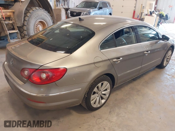 2012 Volkswagen CC Sport with VIN WVWMN7AN9CE508965, listed as a IAAI auction lot 42143188 with 129,205 mi miles. Bid and sale history available at carsss.com. Image 4.