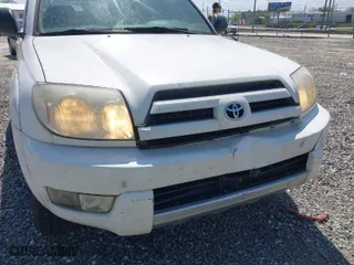 2004 Toyota 4Runner SR5 with VIN JTEZU14R640026906, listed as a IAAI auction lot 42042898 with 351,469 mi miles. Bid and sale history available at carsss.com. Image 6.