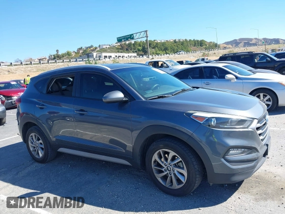 2018 Hyundai Tucson SEL with VIN KM8J3CA42JU618764, listed as a IAAI auction lot 41677046 with 127,980 mi miles. Bid and sale history available at carsss.com. Image 13.