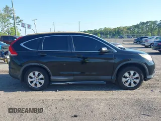2014 Honda CR-V LX with VIN 3CZRM3H37EG710537, listed as a IAAI auction lot 42035744 with 279,482 mi miles. Bid and sale history available at carsss.com. Image 13.