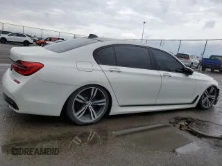 2017 BMW 7 Series 740i with VIN WBA7E2C3XHG741242, listed as a Copart auction lot 51577125 with 101,429 mi miles and Clean Title. Bid and sale history available at carsss.com. Image 3.