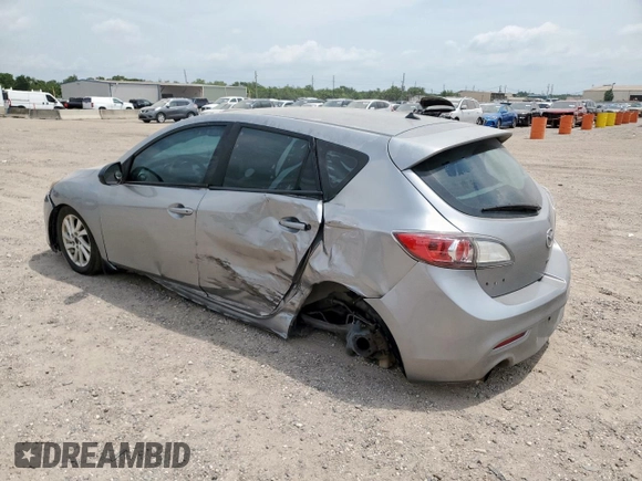 2012 Mazda 3 i Touring with VIN JM1BL1L74C1577899, listed as a Copart auction lot 59716435 with 132,718 mi miles and Salvage title. Bid and sale history available at DreamBid. Image 2.