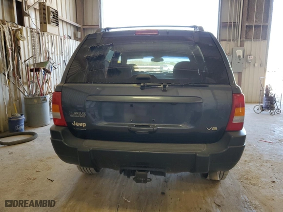 2001 Jeep Grand Cherokee Laredo with VIN 1J4GW48N41C557380, listed as a Copart auction lot 74080604 with 58,005 mi miles and Salvage Title. Bid and sale history available at carsss.com. Image 6.