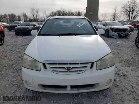 2006 Kia Spectra EX with VIN KNAFE121265208526, listed as a Copart auction lot 80300604 with 101,780 mi miles and Salvage Title. Bid and sale history available at carsss.com. Image 5.