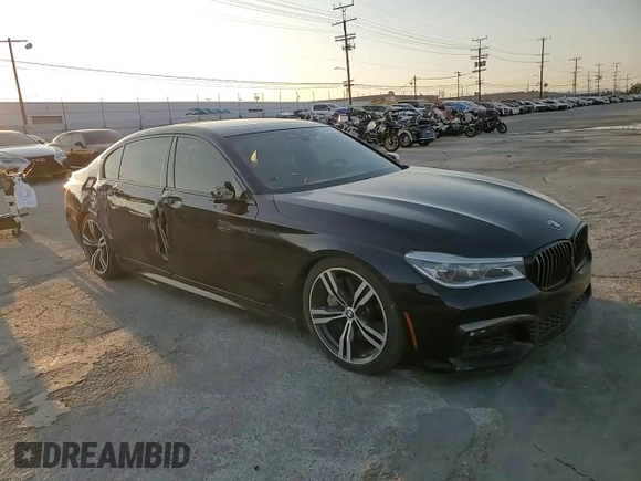2017 BMW 7 Series 750i with VIN WBA7F0C57HGM21136, listed as a Copart auction lot 88525335 with 102,508 mi miles and Salvage title. Bid and sale history available at DreamBid. Image 11.