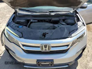2020 Honda Pilot EX-L с VIN 5FNYF5H59LB010398, выставлен на аукционе Copart как лот 51812005 с пробегом 81 000 миль миль и Списание • Salvage title. История ставок и продаж доступна на DreamBid. Изображение 12.