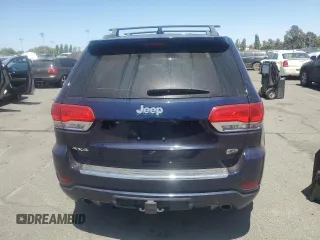 2015 Jeep Grand Cherokee Overland with VIN 1C4RJFCG0FC629863, listed as a Copart auction lot 63098475 with 92,426 mi miles and Salvage title. Bid and sale history available at DreamBid. Image 6.