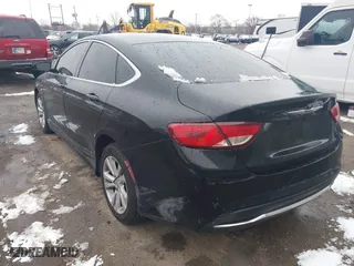 2015 Chrysler 200 Limited with VIN 1C3CCCAB8FN605390, listed as a IAAI auction lot 41175397 with 139,315 mi miles. Bid and sale history available at carsss.com. Image 3.