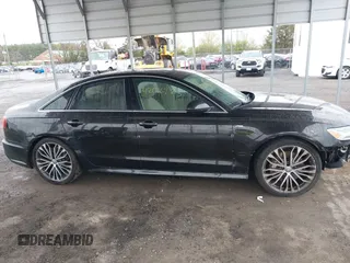 2016 Audi A6 Premium Plus with VIN WAUGFAFCXGN062925, listed as a IAAI auction lot 42016123 with 110,866 mi miles and . Bid and sale history available at DreamBid. Image 13.
