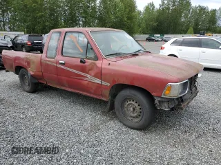 1992 Toyota Pickup DLX z VIN JT4RN93P4N5064218, wystawiony jako Copart lot #58095635 z przebiegiem 256 271 mil mil oraz Tytuł czysty. Historia ofert i sprzedaży dostępna na DreamBid. Obrazek 5.