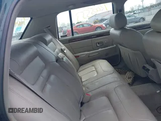1999 Cadillac DeVille DHS z VIN 1G6KE54Y9XU766791, wystawiony jako IAAI lot #42005553 z przebiegiem 140 515 mil mil oraz . Historia ofert i sprzedaży dostępna na DreamBid. Obrazek 8.