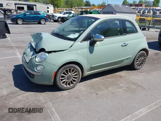 2013 FIAT 500 Lounge with VIN 3C3CFFER4DT512749, listed as a IAAI auction lot 42063224 with 186,157 mi miles and . Bid and sale history available at DreamBid. Image 2.
