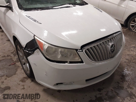 2010 Buick LaCrosse CXL z VIN 1G4GD5EG3AF165301, wystawiony jako IAAI lot #41002449 z przebiegiem 202 659 mil mil oraz . Historia ofert i sprzedaży dostępna na DreamBid. Obrazek 6.
