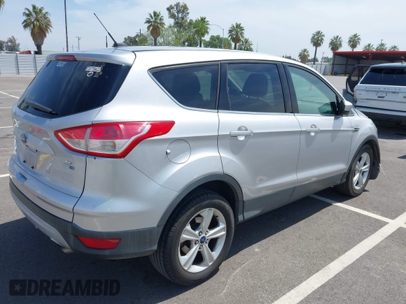 2015 Ford Escape SE with VIN 1FMCU9G93FUA26339, listed as a IAAI auction lot 42039281 with 185,729 mi miles and . Bid and sale history available at DreamBid. Image 4.
