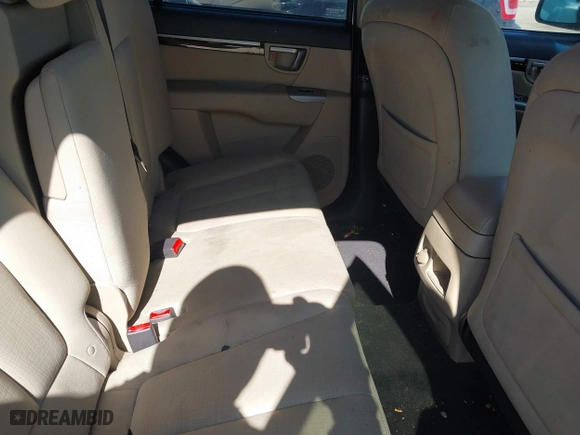 2012 Hyundai Santa Fe GLS with VIN 5XYZG3AB7CG145829, listed as a IAAI auction lot 41768390 with 143,972 mi miles. Bid and sale history available at carsss.com. Image 8.