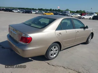 2006 Toyota Camry STD with VIN 4T1BE30K76U704819, listed as a IAAI auction lot 42021982 with 264,934 mi miles and . Bid and sale history available at carsss.com. Image 4.