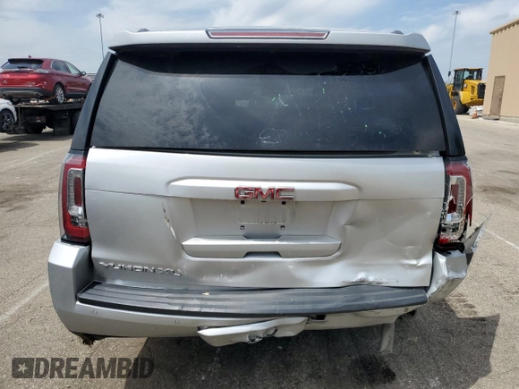 2019 GMC Yukon XL SLT z VIN 1GKS1GKC8KR245444, wystawiony jako Copart lot #55600905 z przebiegiem 106 345 mil mil oraz Szkoda całkowita • Salvage title. Historia ofert i sprzedaży dostępna na DreamBid. Obrazek 6.