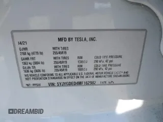 2021 Tesla Model Y Standard Range z VIN 5YJYGDED4MF162982, wystawiony jako IAAI lot #41378674 z przebiegiem 60 267 mil mil oraz . Historia ofert i sprzedaży dostępna na DreamBid. Obrazek 9.