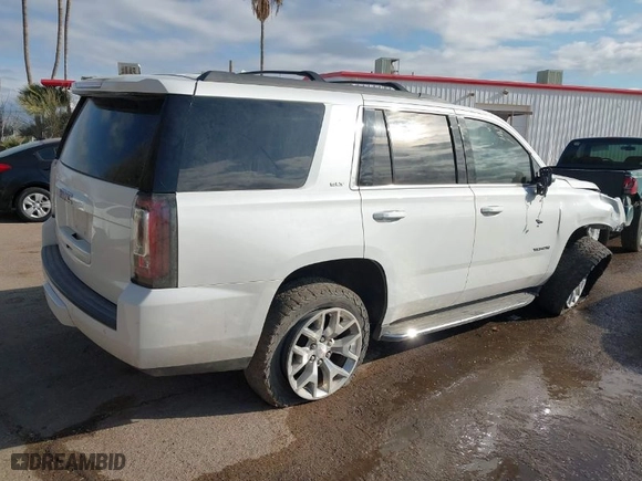 2017 GMC Yukon SLT with VIN 1GKS2BKC7HR376552, listed as a IAAI auction lot 41450226 with 124,590 mi miles. Bid and sale history available at carsss.com. Image 4.