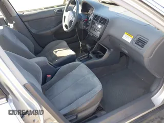 1999 Honda Civic LX with VIN JHMEJ6670XS000958, listed as a IAAI auction lot 41620949 with 93,698 mi miles and . Bid and sale history available at DreamBid. Image 5.