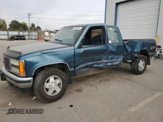 1992 GMC Sierra 1500 z VIN 2GTEK19K1N1537823, wystawiony jako Copart lot #74952004 z przebiegiem 147 810 mil mil oraz Szkody całkowita. Historia ofert i sprzedaży dostępna na DreamBid. Obrazek 1.