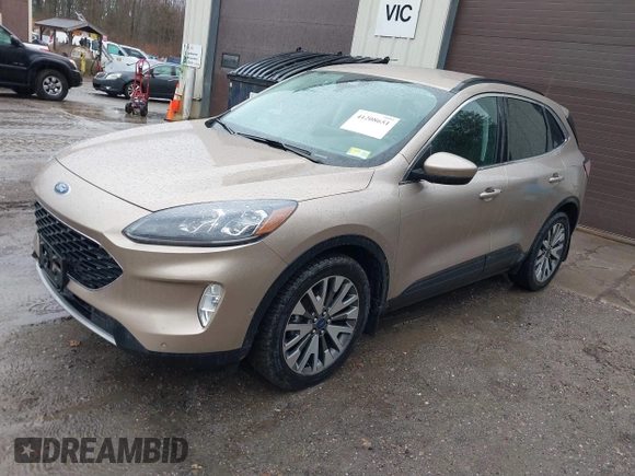 2021 Ford Escape Titanium Hybrid with VIN 1FMCU9DZXMUA66161, listed as a IAAI auction lot 41208651 with 61,198 mi miles and . Bid and sale history available at DreamBid. Image 18.