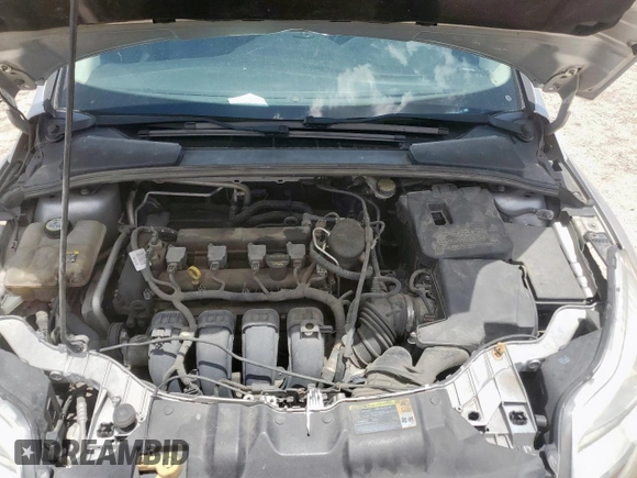 2012 Ford Focus SE with VIN 1FAHP3F29CL287498, listed as a Copart auction lot 61476855 with 139,801 mi miles and Salvage title. Bid and sale history available at DreamBid. Image 11.