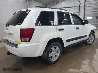 2006 Jeep Grand Cherokee Laredo with VIN 1J8GR48K06C163877, listed as a IAAI auction lot 41971240 with 250,544 mi miles. Bid and sale history available at carsss.com. Image 4.