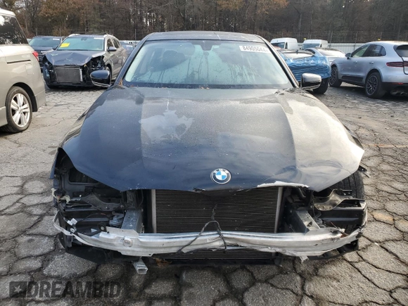 2018 BMW 7 Series 740i with VIN WBA7E2C58JG743269, listed as a Copart auction lot 84905044 with 74,951 mi miles and Salvage Title. Bid and sale history available at carsss.com. Image 5.