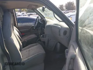 2005 Chevrolet Astro Cargo Van with VIN 1GCDM19X45B130922, listed as a IAAI auction lot 41196801 with 125,309 mi miles. Bid and sale history available at carsss.com. Image 5.